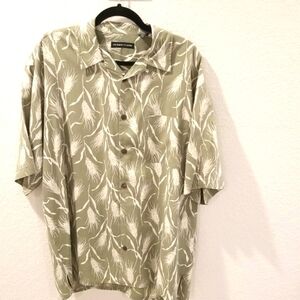 Bobby Chan ,silk casual shirt ,size XL ,front pocket.Short sleeves.